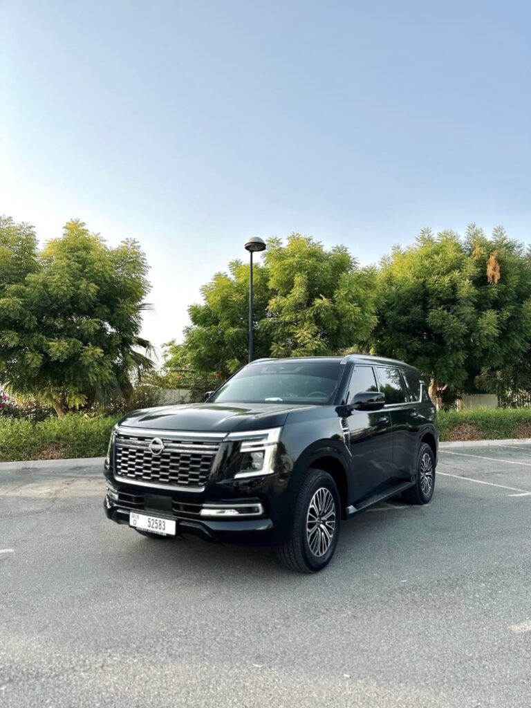 Nissan Patrol Black rental Dubai front angle luxury SUV