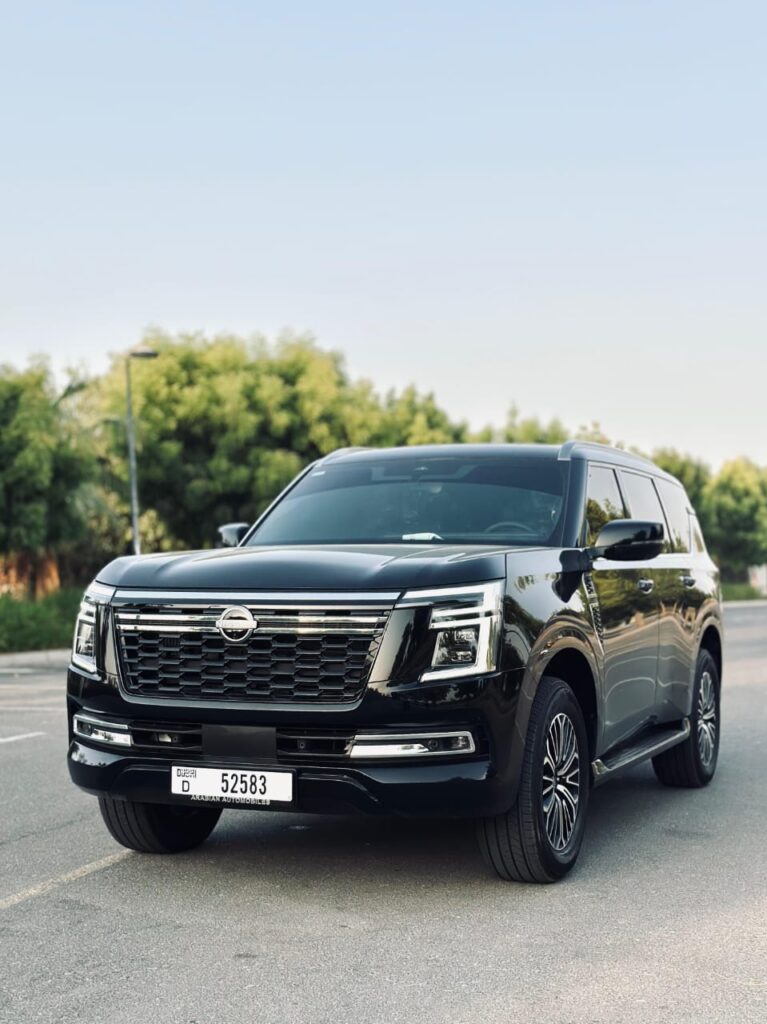 Nissan Patrol Black rental Dubai front angle luxury SUV
