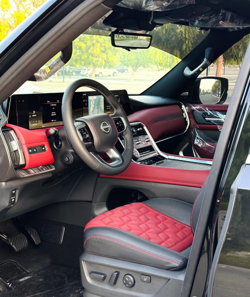 Interior Nissan Patrol Black rental Dubai with premium leather seats