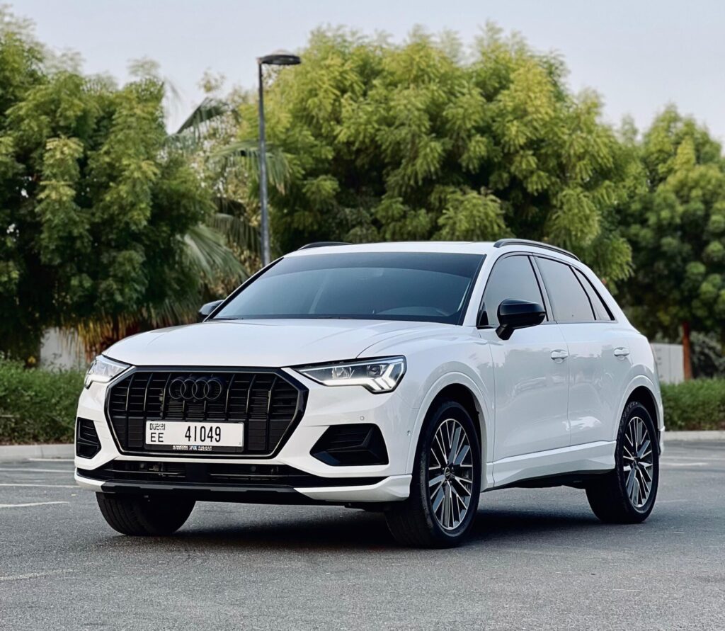 Audi Q3 Rental Dubai — front three-quarter view at sunset