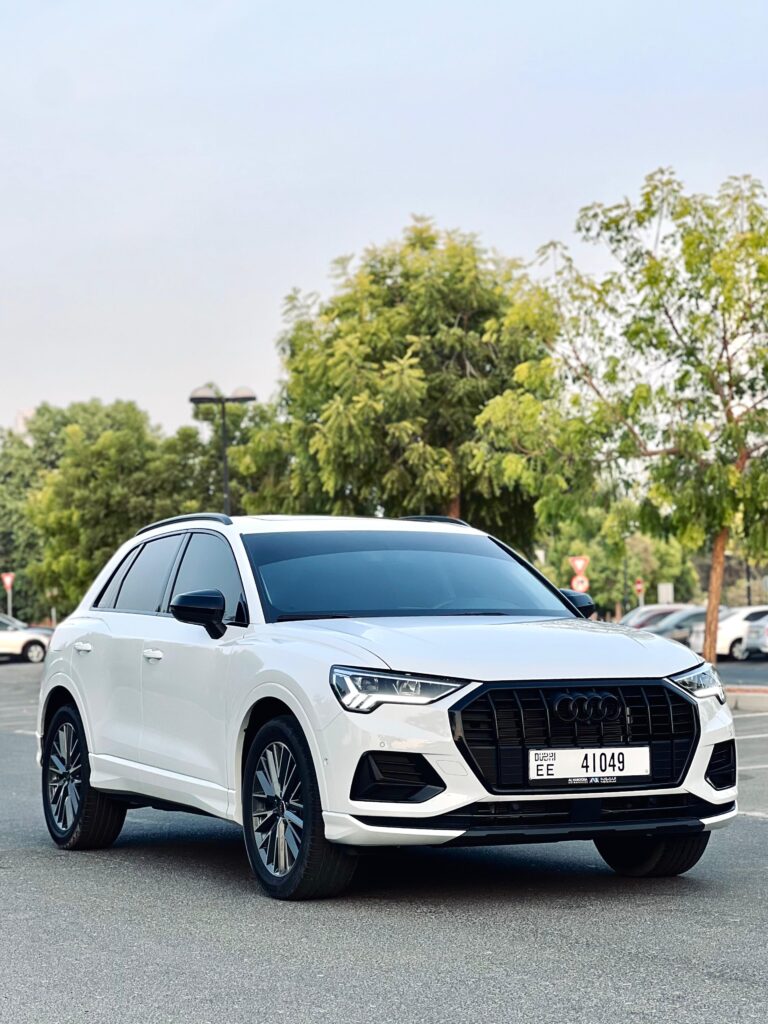 Audi Q3 Rental Dubai — front three-quarter view at sunset