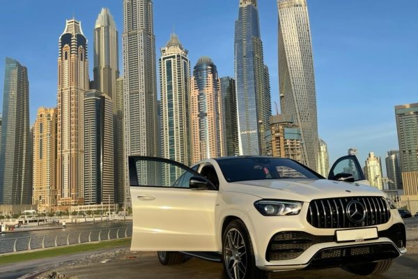 Driver enjoying Mercedes GLE 63 AMG rental Dubai with 24/7 service