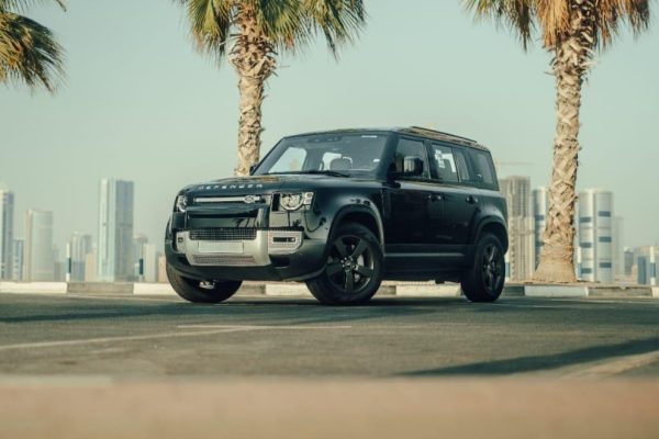 Side profile Land Rover Defender for rent in Dubai luxury car